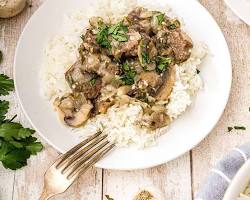 LOMO AL CHAMPIGNON CON GUARNICION